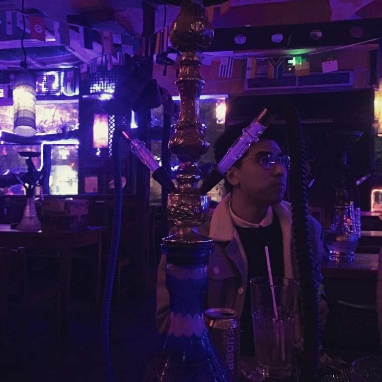 Photo of Jun Weng in a Bar