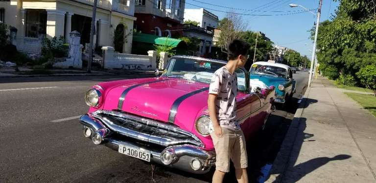 Photo of Jun Weng and Vintage Car in Cuba